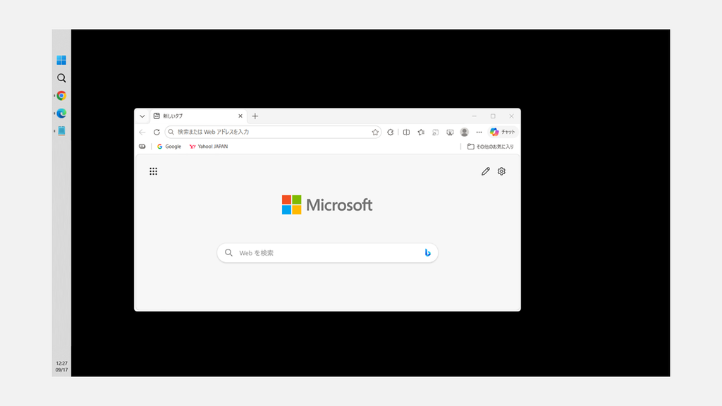 タスクバーを左に移動し、画面の左端に縦向きのタスクバーと虫眼鏡のアイコンが表示された状態のスクリーンショット